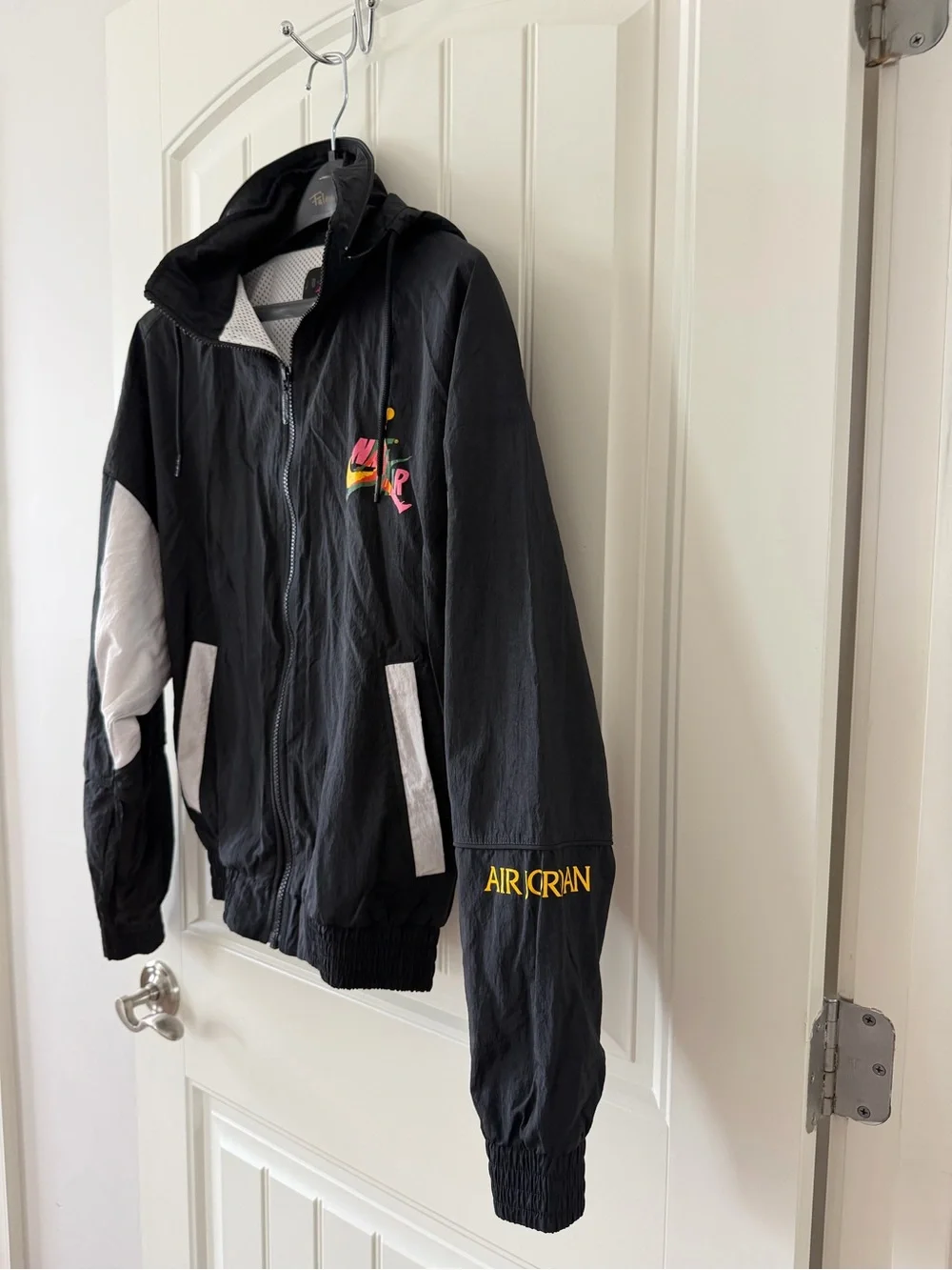 Jordan Black Hooded Windbreaker with Multicolor Logo Accent
